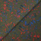 Crinkle muslin printed in royal blue and red with khaki background