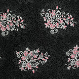 Maille de viscose satinée imprimé pois et fleurs fond noir