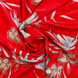 Maille de viscose satinée Hawaii fond rouge fraise