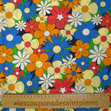 Coton imprimé floraison disco bleu roi, orange et jaune pâle