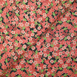 Cotton printed cherry blossoms coral pink black background