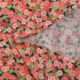 Cotton printed cherry blossoms coral pink black background
