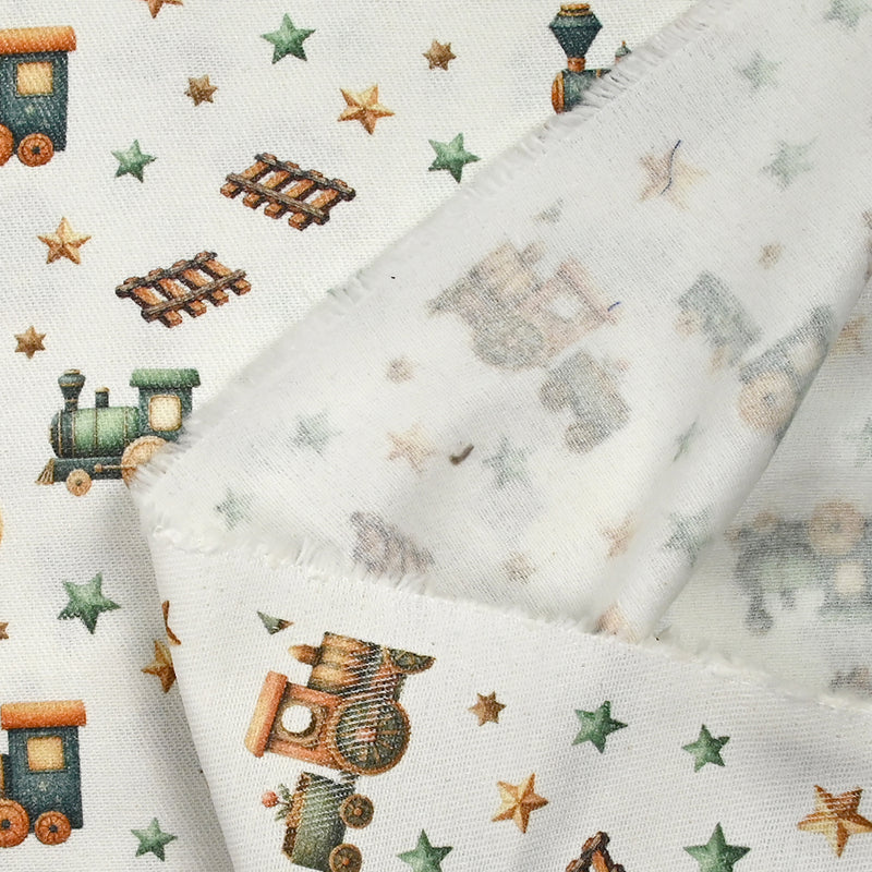 Coton imprimé petit train et étoiles fond blanc