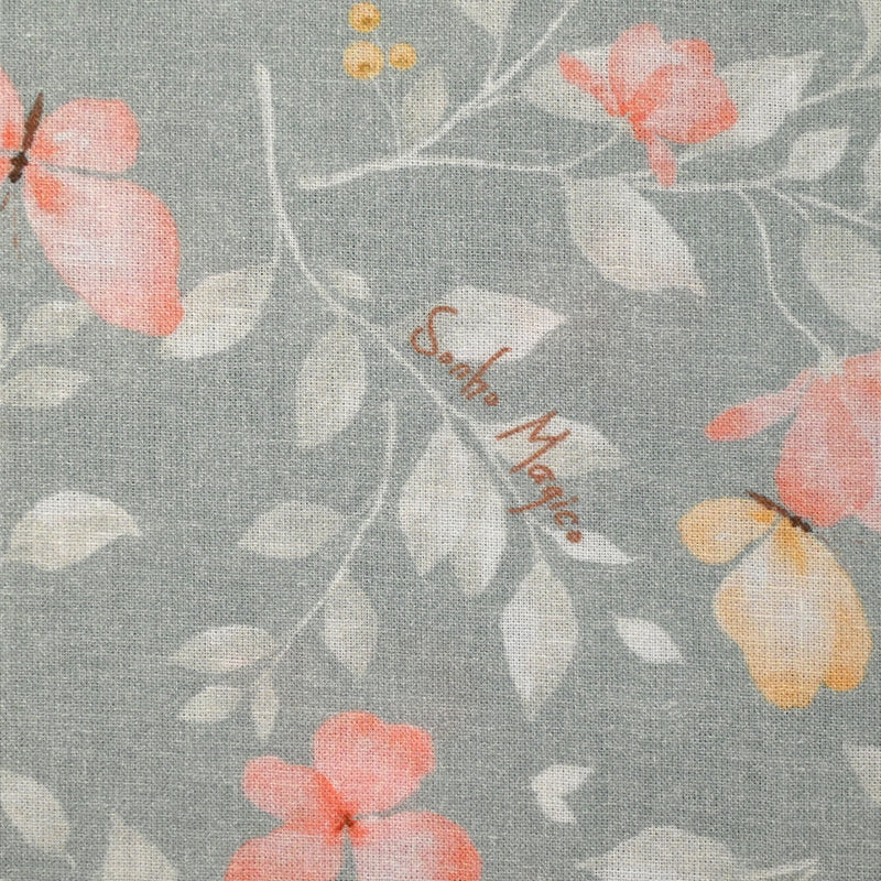 Coton imprimé fleurs magiques fond gris
