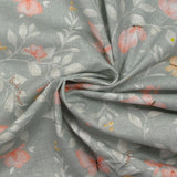 Coton imprimé fleurs magiques fond gris
