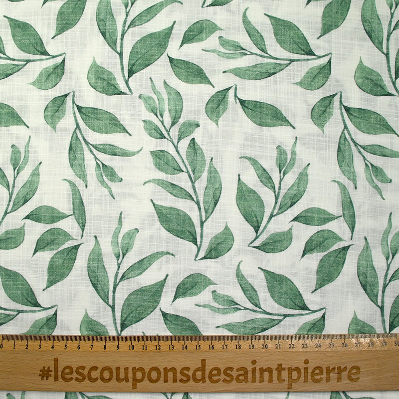 Coton tissé aspect lin imprimé feuilles volantes fond blanc