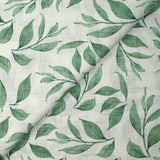 Coton tissé aspect lin imprimé feuilles volantes fond blanc