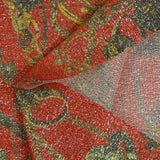 Maille polyester lamée bijoux et chaînes fond rouge