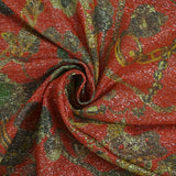 Maille polyester lamée bijoux et chaînes fond rouge