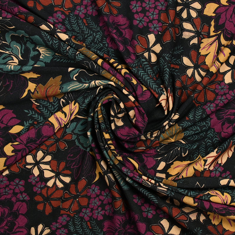 Maille polyester imprimée fine floraison violet et canard fond noir
