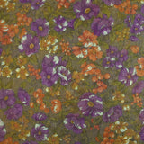 Maille polyester lamée fleurs violet et orange fond marron