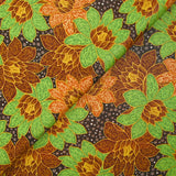 Cotton printed with winter shine, brown background