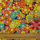 Coton imprimé flower power corail fond bleu roi