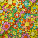 Coton imprimé flower power rose fond vert