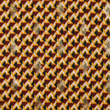 Maille crêpe imprimée triangle et losange doré fond jaune
