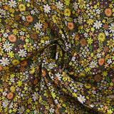 Coton imprimé prairie en fleurs jaune fond marron foncé