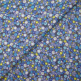 Coton imprimé prairie en fleurs bleu fond indigo