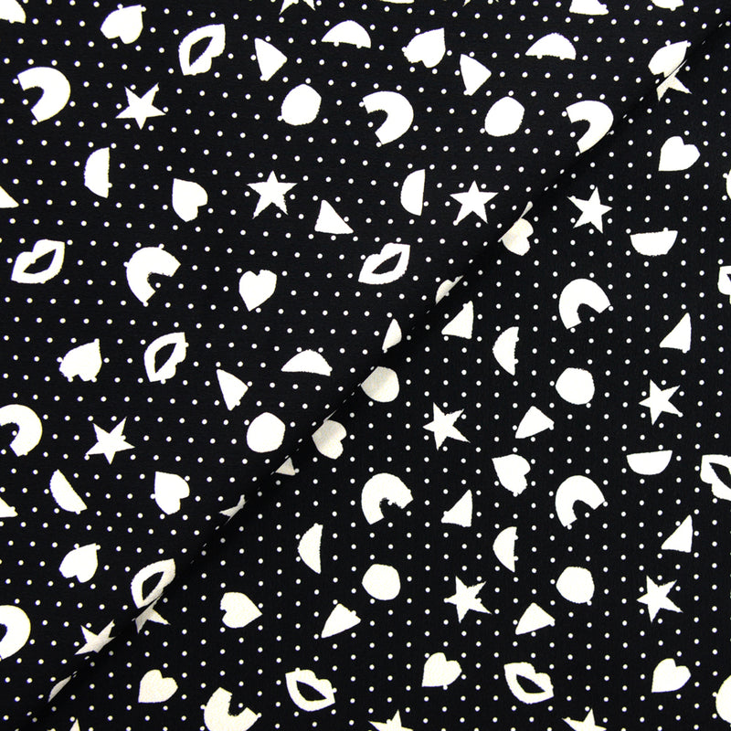 Crêpe polyester fin imprimé bouche à pois fond noir