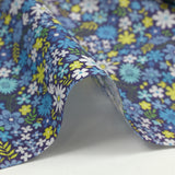 Coton imprimé prairie en fleurs bleu fond indigo
