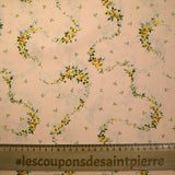 Crêpe imprimé serpent de fleurs fond pêche