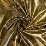 Estampado fino de poliéster dorado.