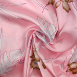 Satin polyester fin imprimé Hawaii fond rose