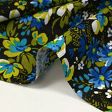 Coton imprimé vent floral bleu fond noir