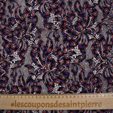Dentelle festonnée imprimée fleurs rouge et violette fond noir