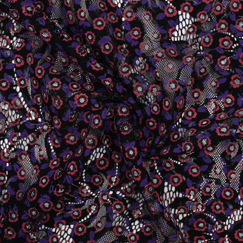 Dentelle festonnée imprimée fleurs rouge et violette fond noir
