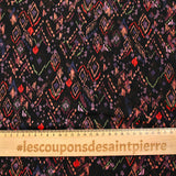 Maille crêpe imprimée ethnique fond noir