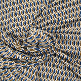 Maille crêpe imprimée vague bleu et marron fond écru