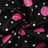 Satin duchesse imprimé roses et pois fond noir