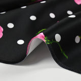 Satin duchesse imprimé roses et pois fond noir