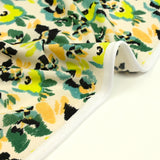 Maille crêpe imprimée jardin botanique vert fond écru