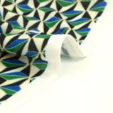 Maille crêpe imprimée vert et bleu graphique