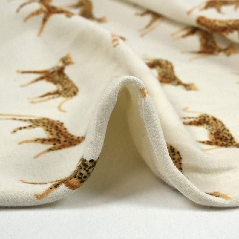 Jersey de coton french terry imprimé panthère fond écru