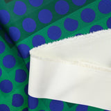 Gabardine de laine mélangée imprimée gros pois bleu fond vert