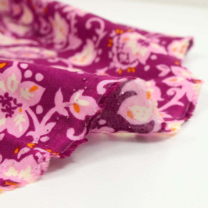 Viscose imprimée fleurs arabesque fond violet