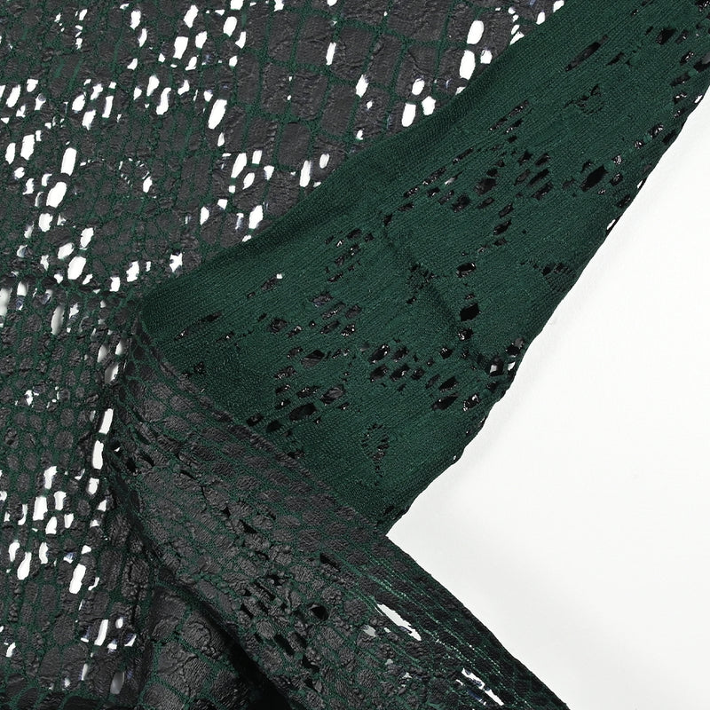 Maille dentelle ajourée impression reptile fond vert foncé
