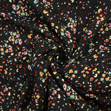 Mousseline imprimée crinkle confettis fond noir