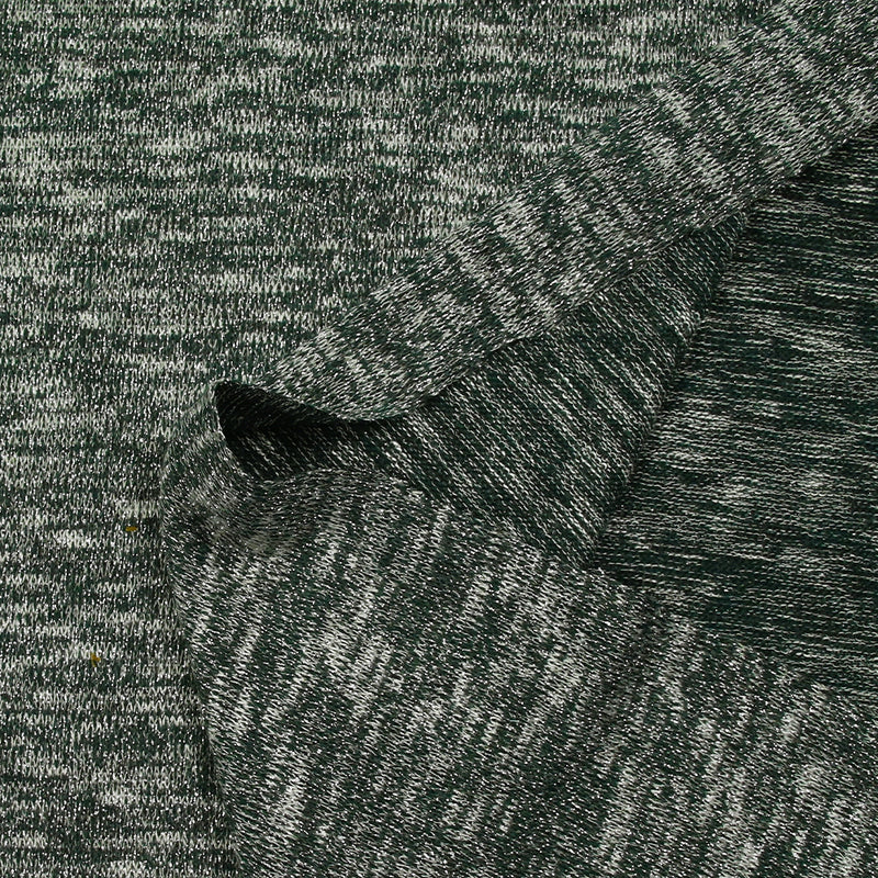 Maille tricot lurex argent fond vert foncé
