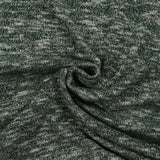 Maille tricot lurex argent fond vert foncé