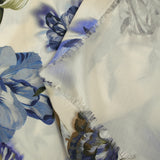 Viscosa estampada con tulipanes entrelazados fondo azul y crudo