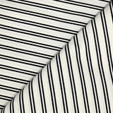 Polycoton élasthane rayé noir sur fond blanc