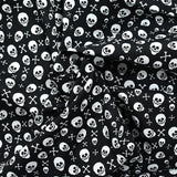 Coton imprimé le trésor des squelettes fond noir