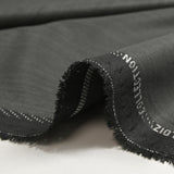 Tissu tailleur laine mélangée fantaisie gris clair fond anthracite