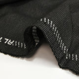 Tissu tailleur laine mélangée fantaisie gris chiné fond noir