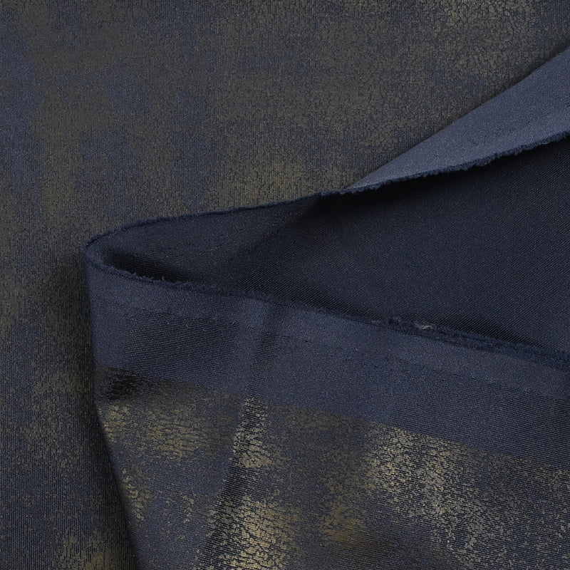 Maille polyester imprimée marbré fond bleu nuit