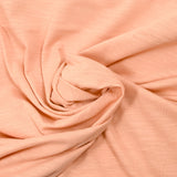 Jersey de coton flammé pêche rosé