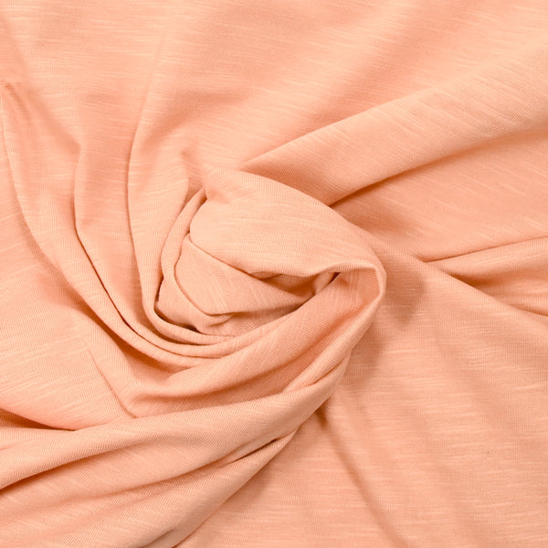 Jersey de coton flammé pêche rosé